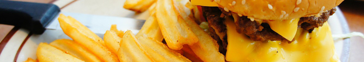 Eating Burger at Sport Burger restaurant in Wichita, KS.